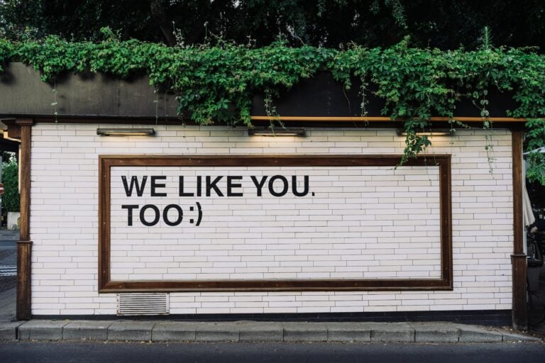 we like you too written on a billboard
