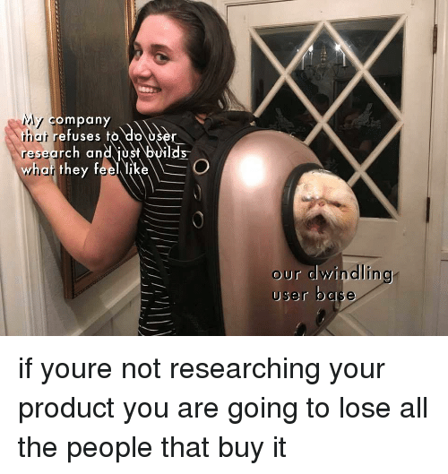 meme of a woman smiling with her cat in a back pack that it's not happy to be in