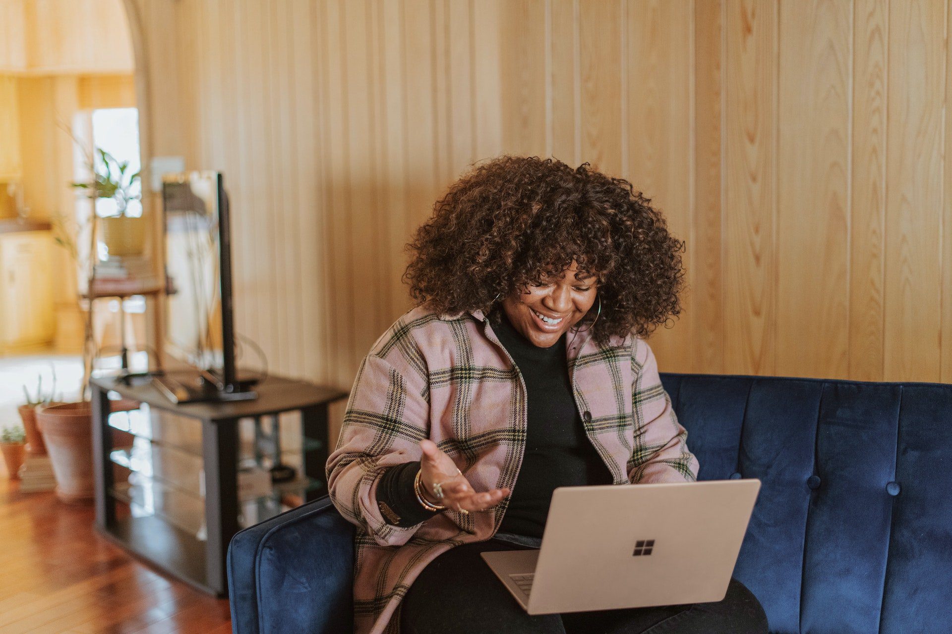 woman speaking on a laptop